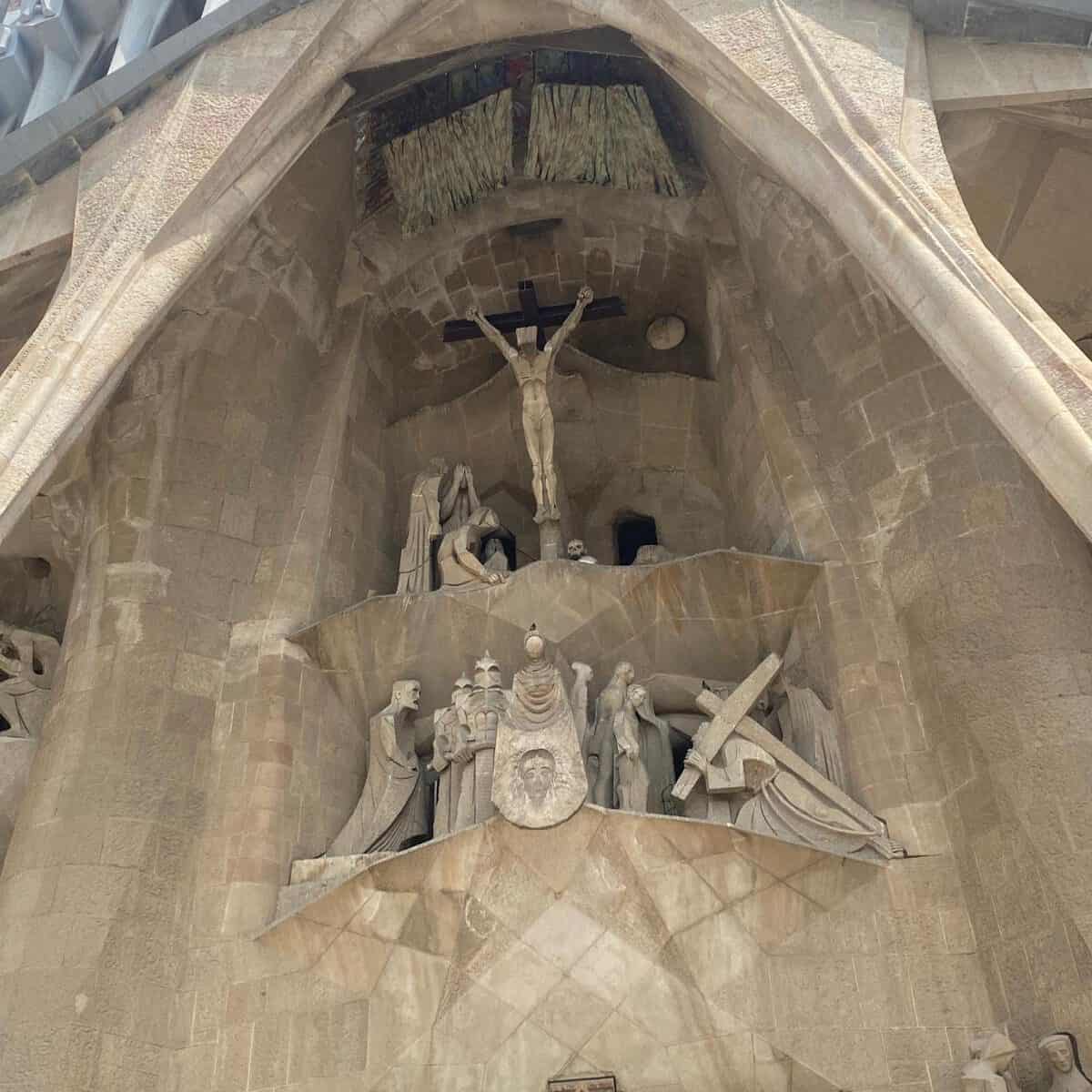 Sagrada Familia Passion Façade sculptures depicting the crucifixion and resurrection scenes.
